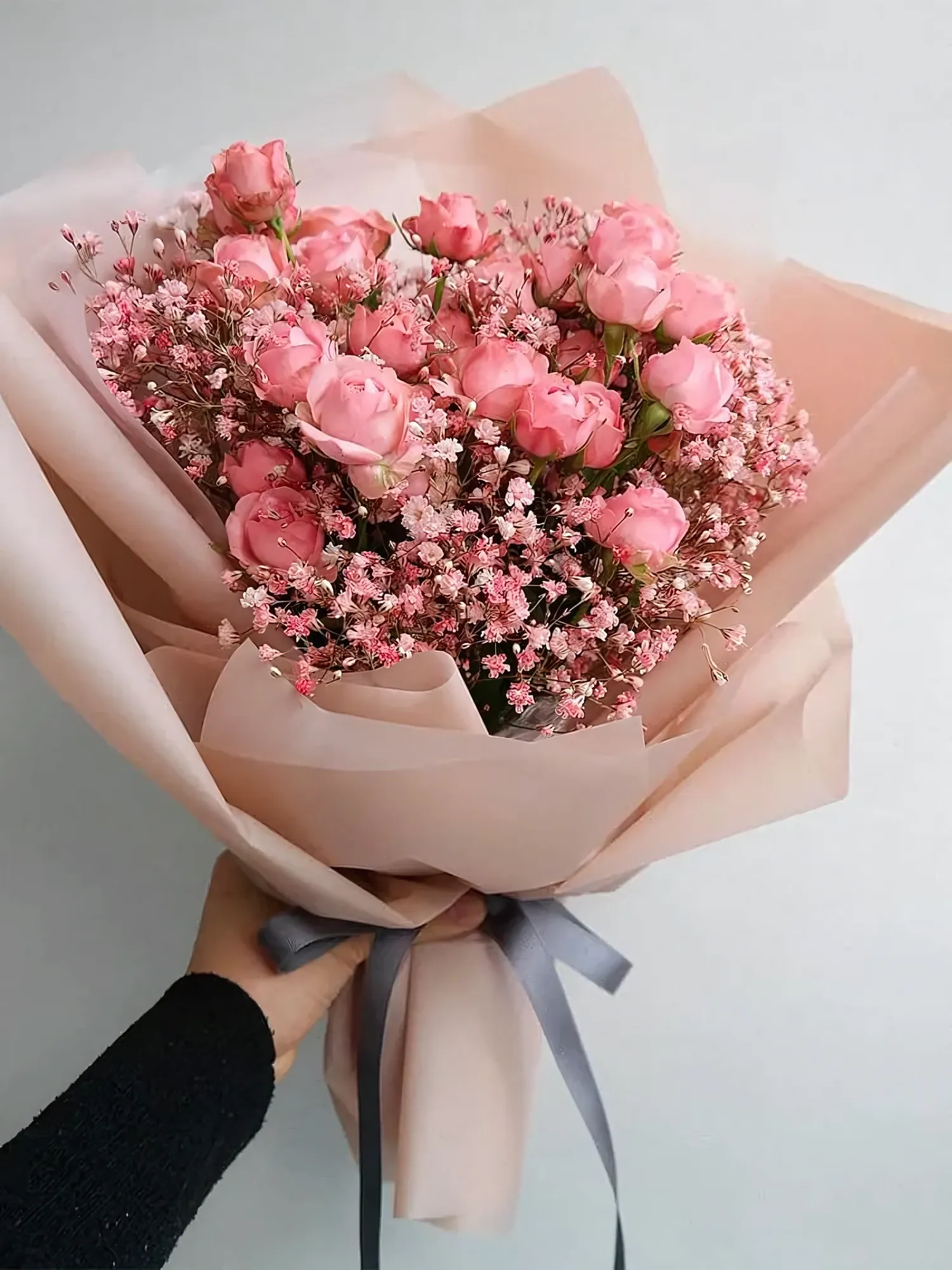 Bouquet of roses and gypsophila
