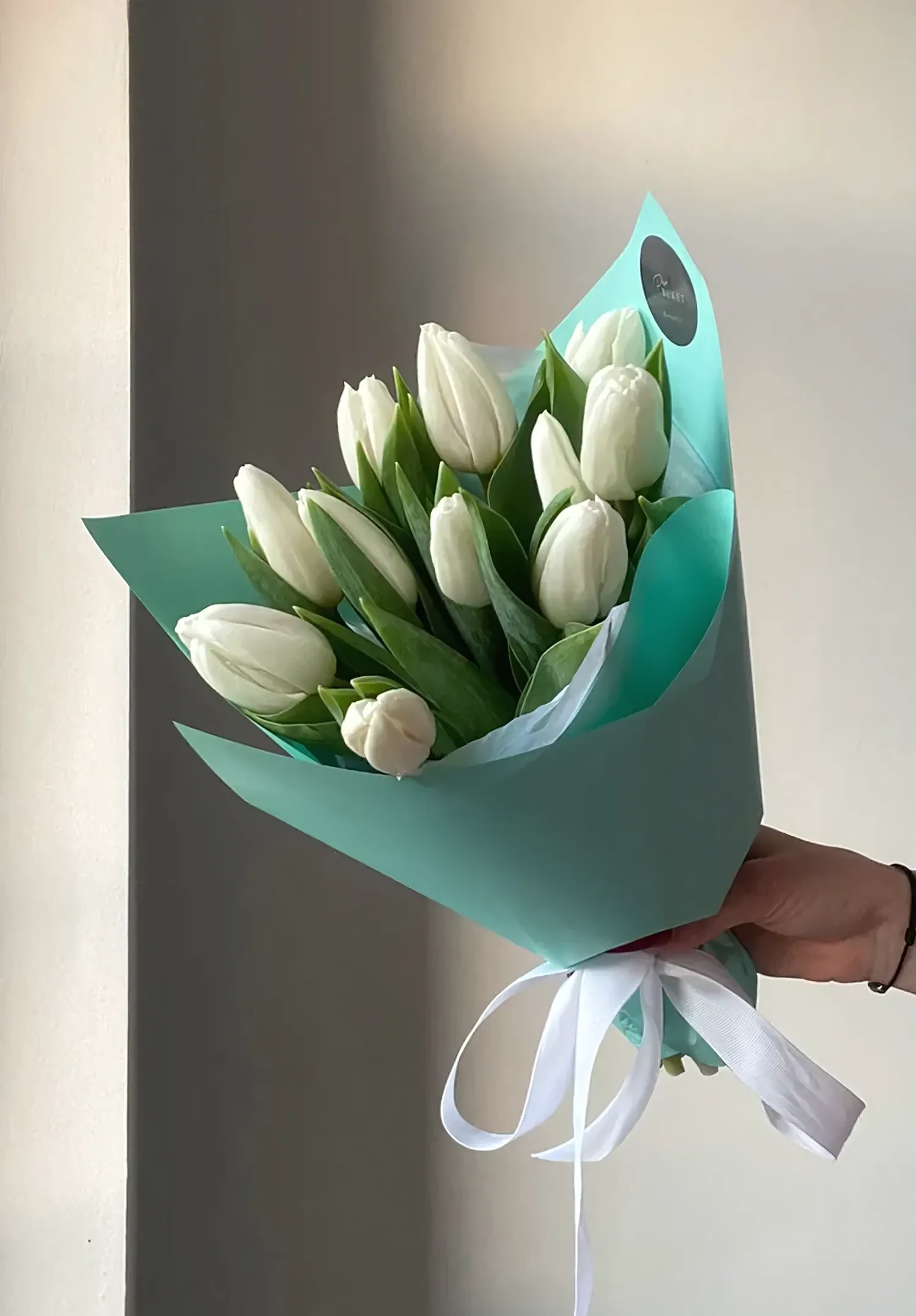 11 white tulips